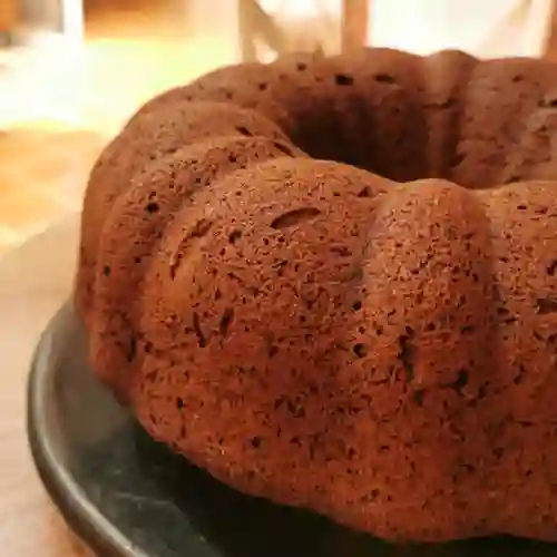 Porción torta naranja con amapola