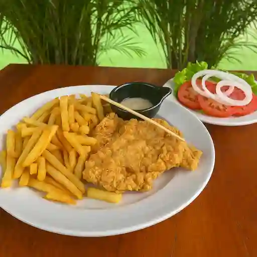 Milanesa de cerdo con salsa ranch