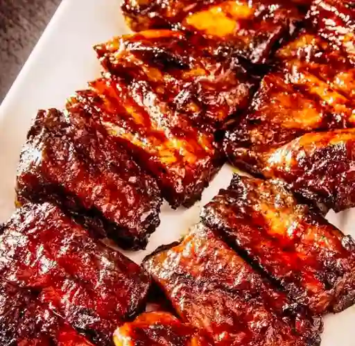 Costillas Medio Rack en Salsa BBQ Passion Fruits