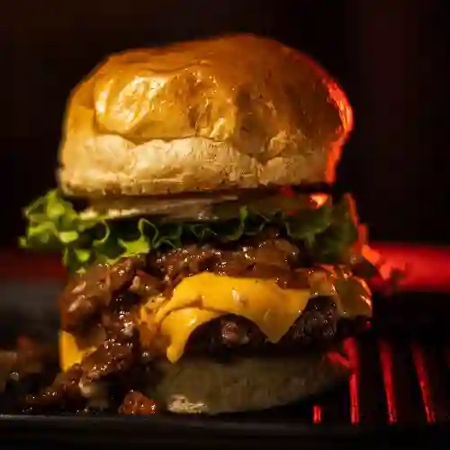 Hamburguesa res angus más 1 acompañante