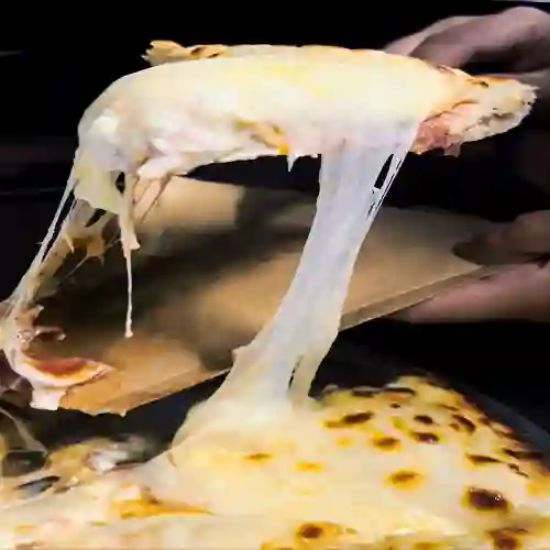 Pizzas estofadas de pollo desmechado
