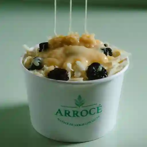 Arrocé uvas pasas,queso y leche condensa