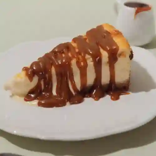 Porción con Arequipe Tarta de Queso