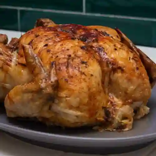 1 Pollo Al Horno y 3 Acompañantes
