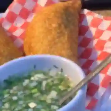 una Empanada de Lechona