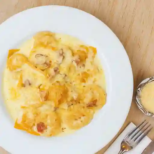 Ravioli maíz y maduro carbonara