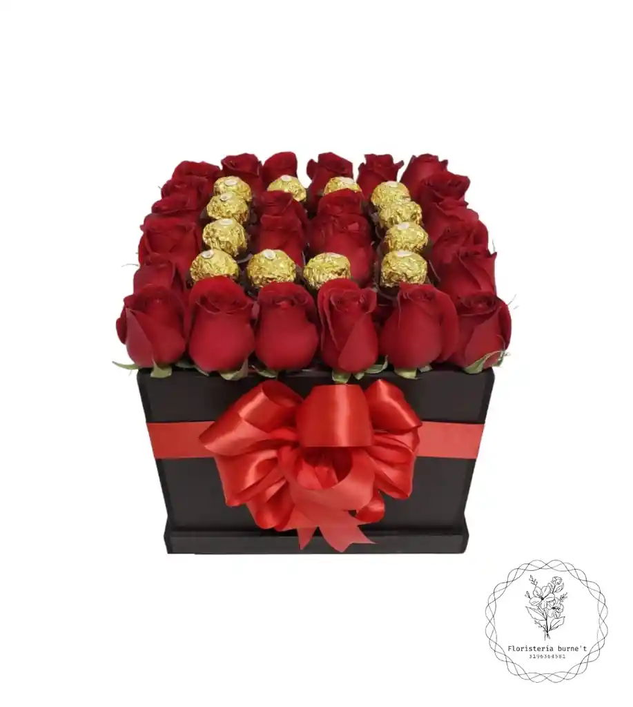 rosas en caja de regalo y ferrero