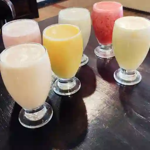 Jugo Natural en Leche 9 Oz