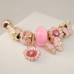 Pulsera Rosa Con Charms Flor De Loto Y Mariposa - Acero