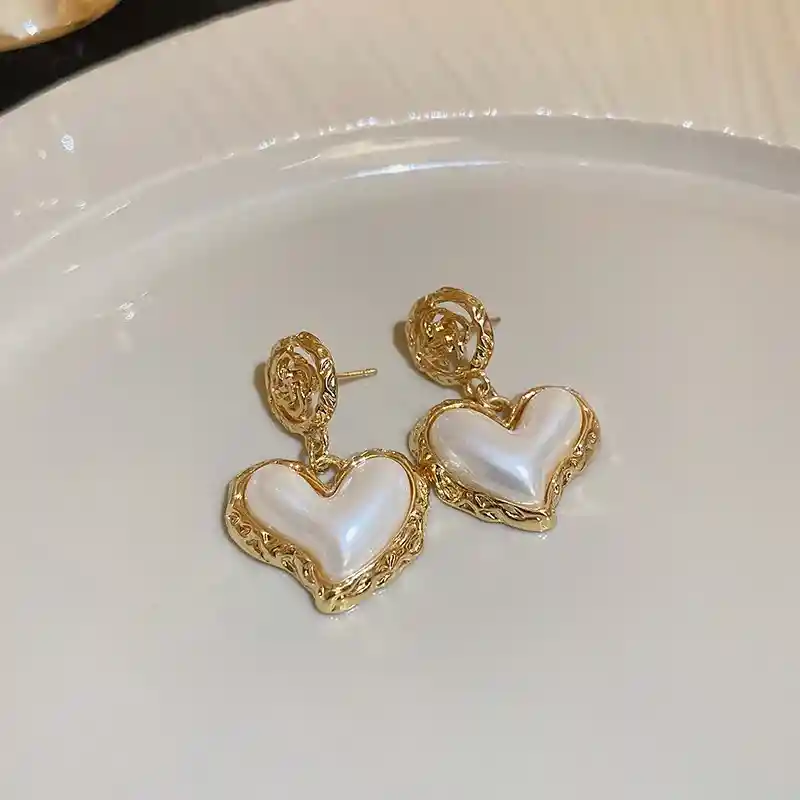 Aretes Clavel