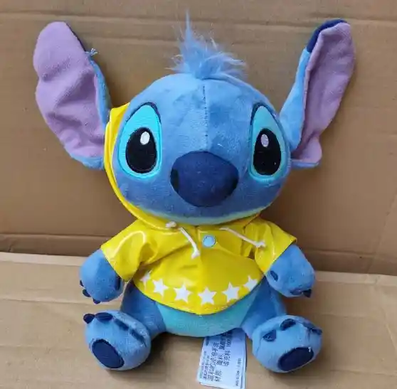 Peluche Stitch Mediano Con Impermeable Amarillo