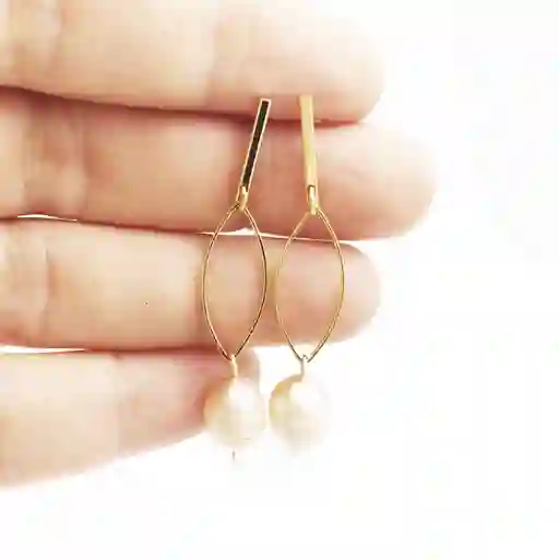 Aretes Ojitos Con Perla Rosada