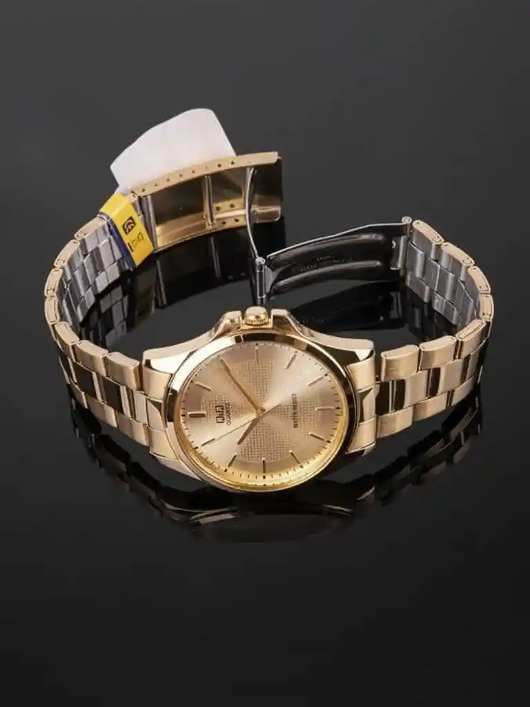 Reloj Qyq Qa06j010y Dorado Acero Hombre + Estuche