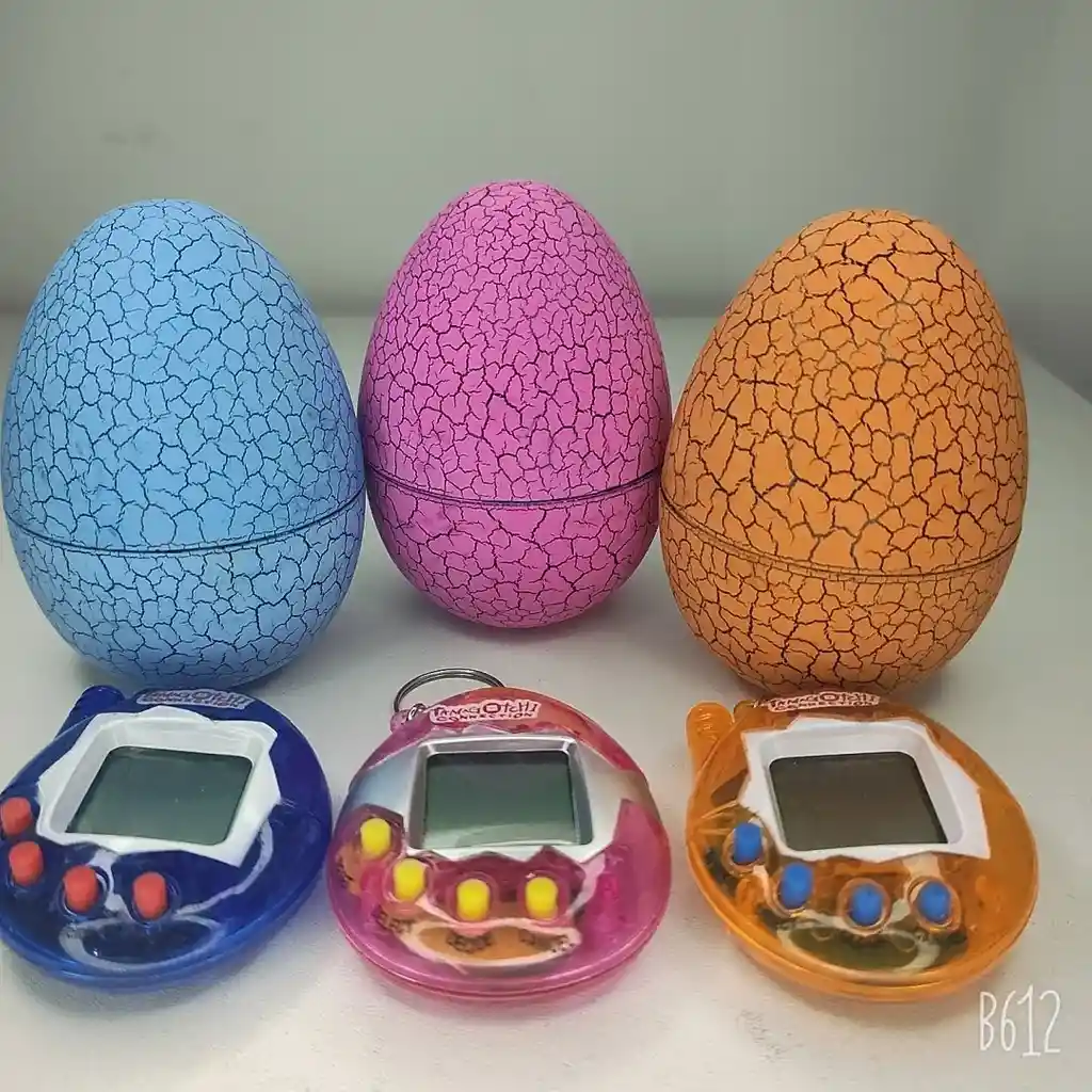 Tamagotchi 168 Mascotas Virtuales Huevo Dinosaurio Llavero Color Rosado