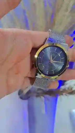 Reloj Qyq