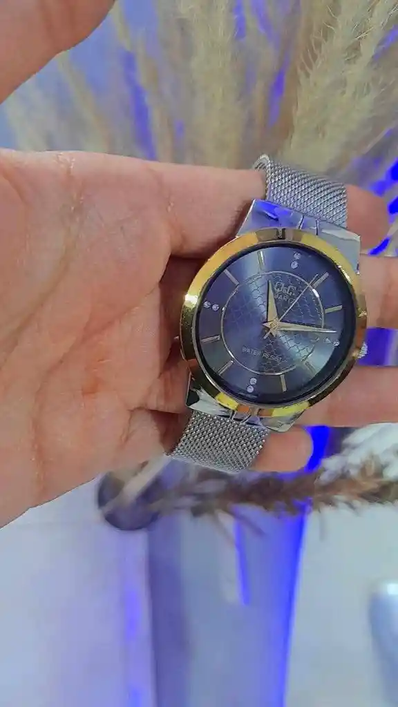 Reloj Qyq