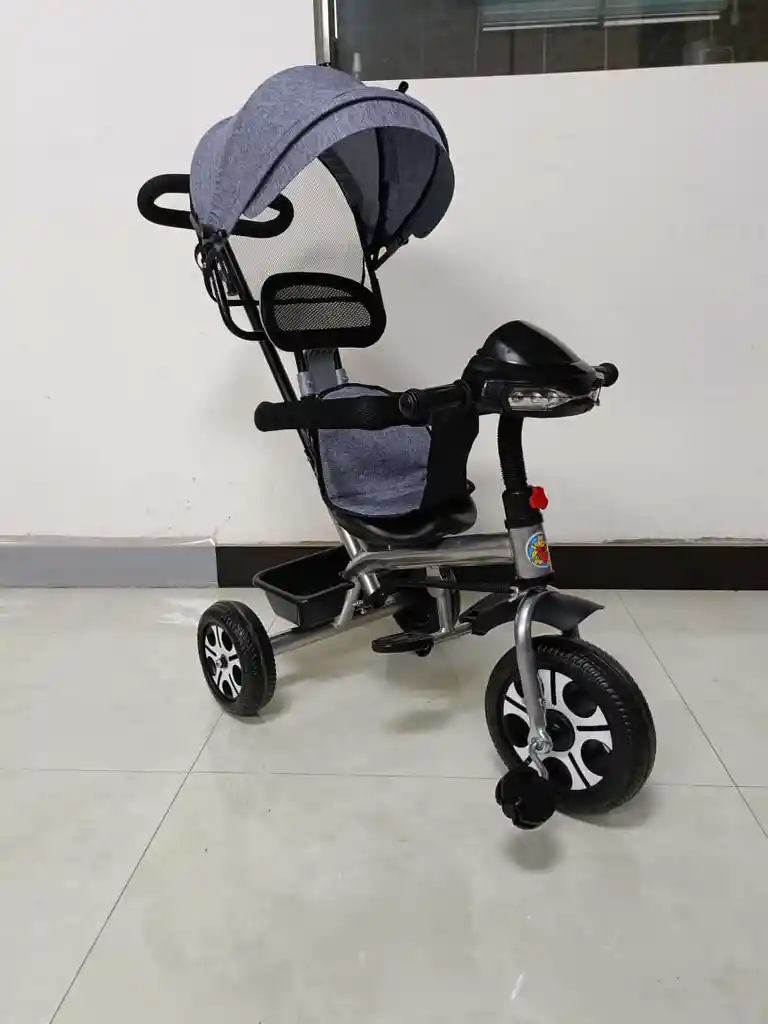 Triciclo Con Guía Bebe Niño Niña Musical Luces Paseador Gris