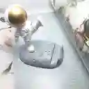 Trípode Astronauta Casco Dorado