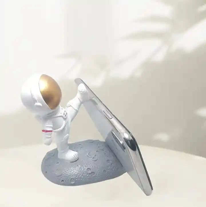 Trípode Astronauta Casco Dorado