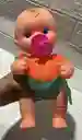 Bebe Plastico Cocolino Con Babero Mediano