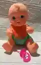 Bebe Plastico Cocolino Con Babero Mediano