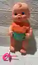 Bebe Plastico Cocolino Con Babero Mediano