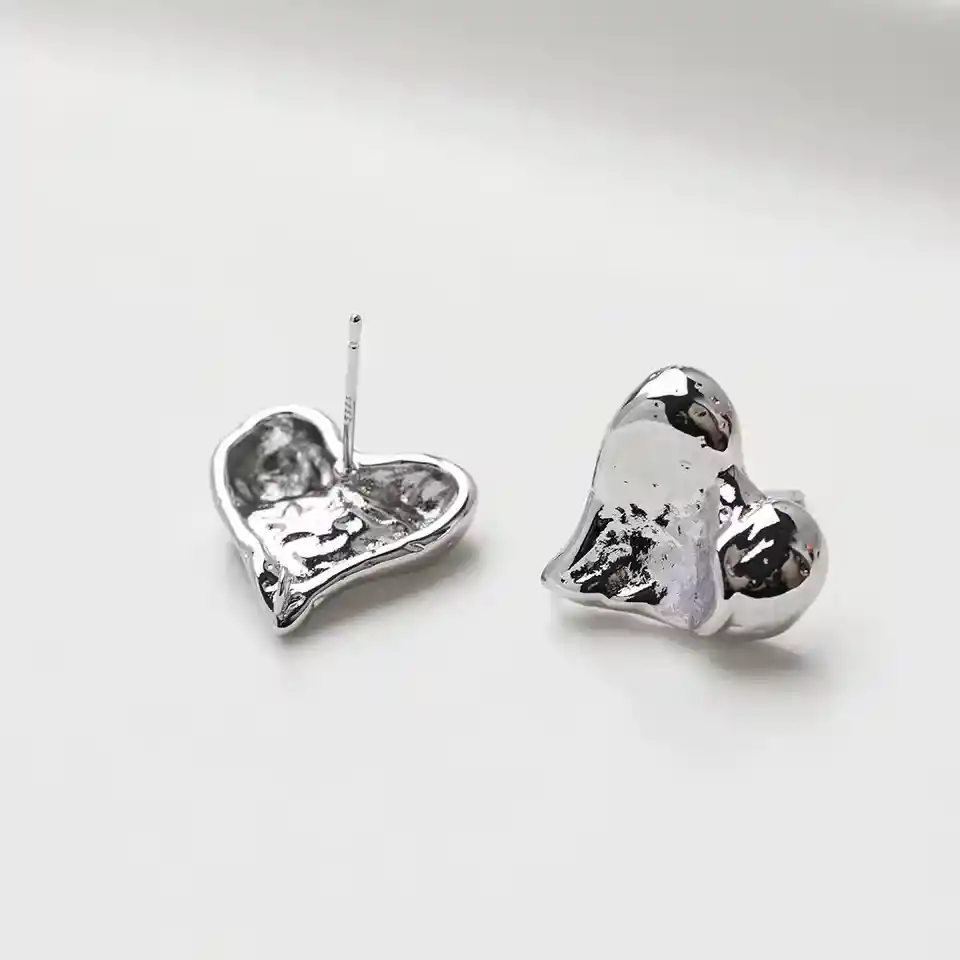 Aretes Corazon Fantasia Plateados