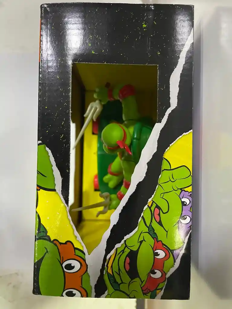 Figura Tortuga Ninja En Patineta Con Impulso Raphael