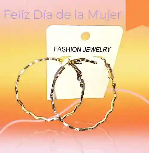 Aretes Candongas Doradas En Ondas En Acero Quirurjico Inoxidable