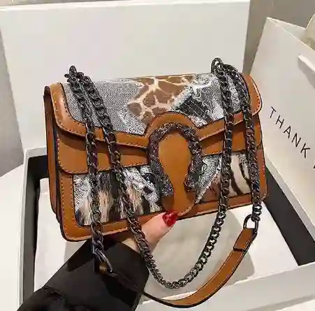 Bolso Cobra Print Cafe Claro