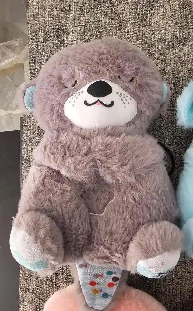 Peluche Nutria Musical Movimientos Y Luces Para Bebés Gris