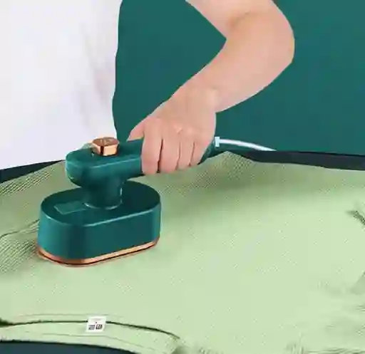 Mini Plancha A Vapor Para Ropa Viajera Ovalada