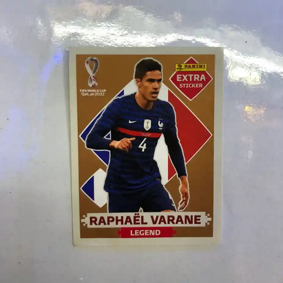 Lamina Extra Sticker Bronce Raphael Varane Para Album Panini Copa Mundial Qatar 2022