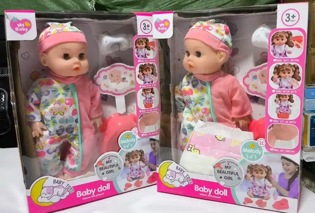 Bebe Muñeco Con Sonidos Toma Tetero Hace Pipi Juguete