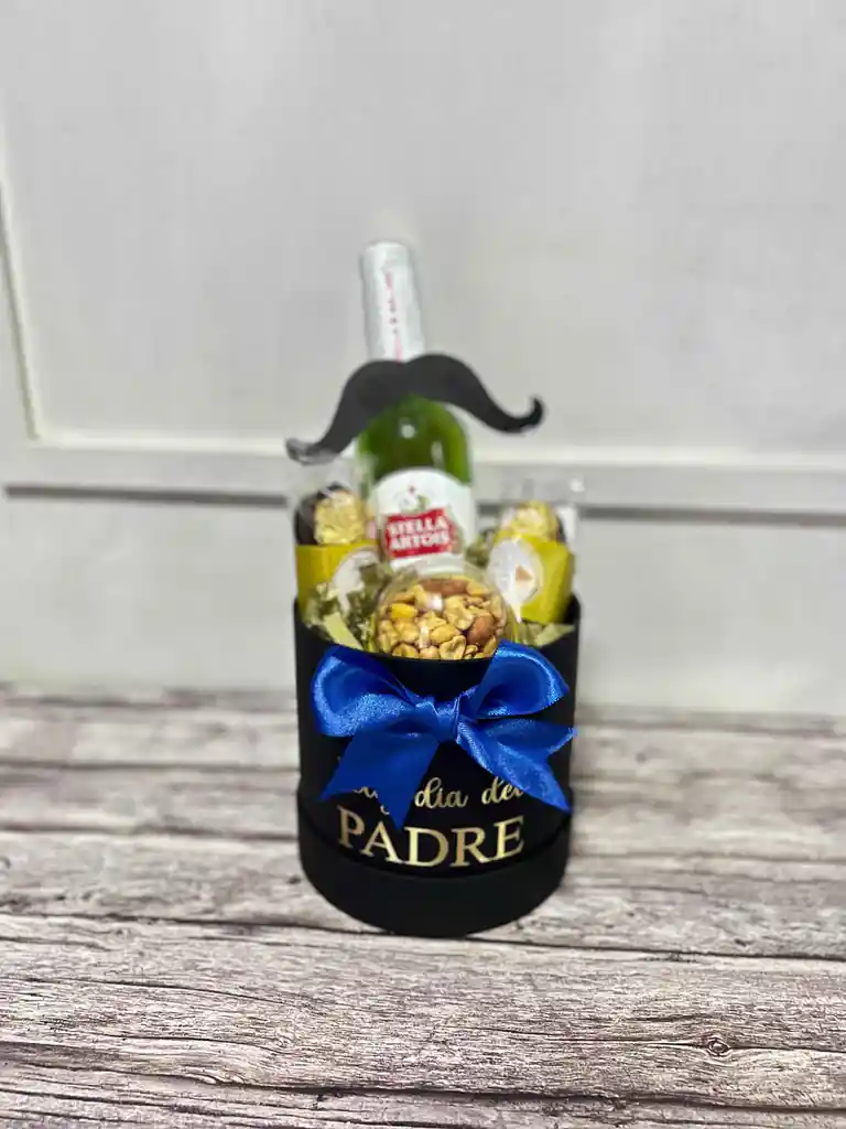 Cilindro Mini Tipo Ancheta Con Ceveza Stella, Chocolates Ferreros Rocher Y Frutos Secos