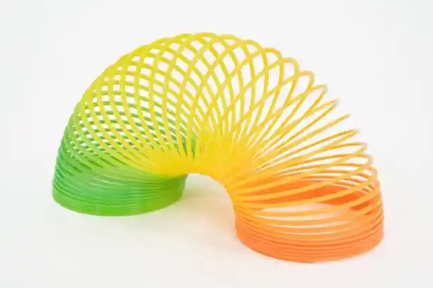 Juguete Resorte Slinky Neón Grande 7cm De Diámetro