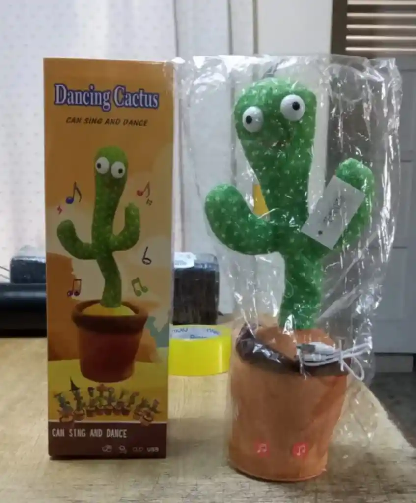 Juguete Muñeco Cactus Bailarin Imita La Voz Recargable.