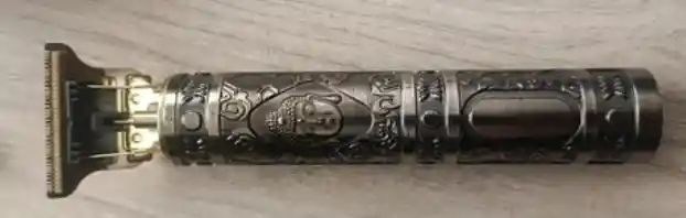 Cortadora De Pelo Eléctrica Con Diseño De Buda Bronce