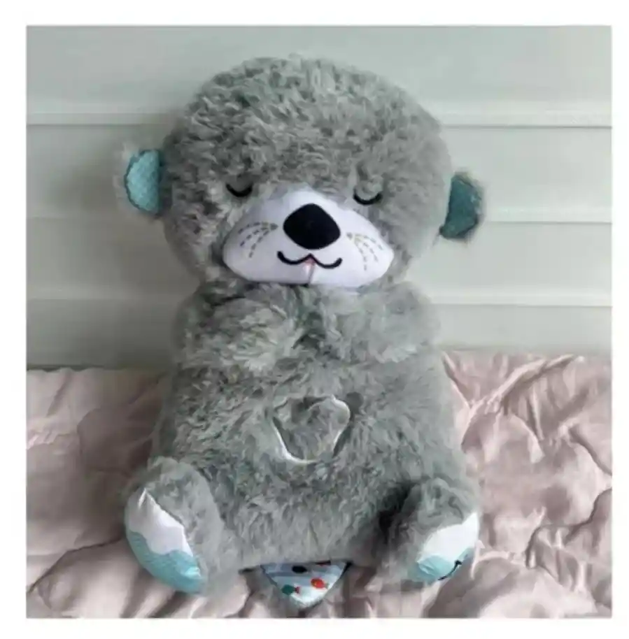 Peluche Nutria Musical Con Movimientos Y Luces Para Bebés Gris