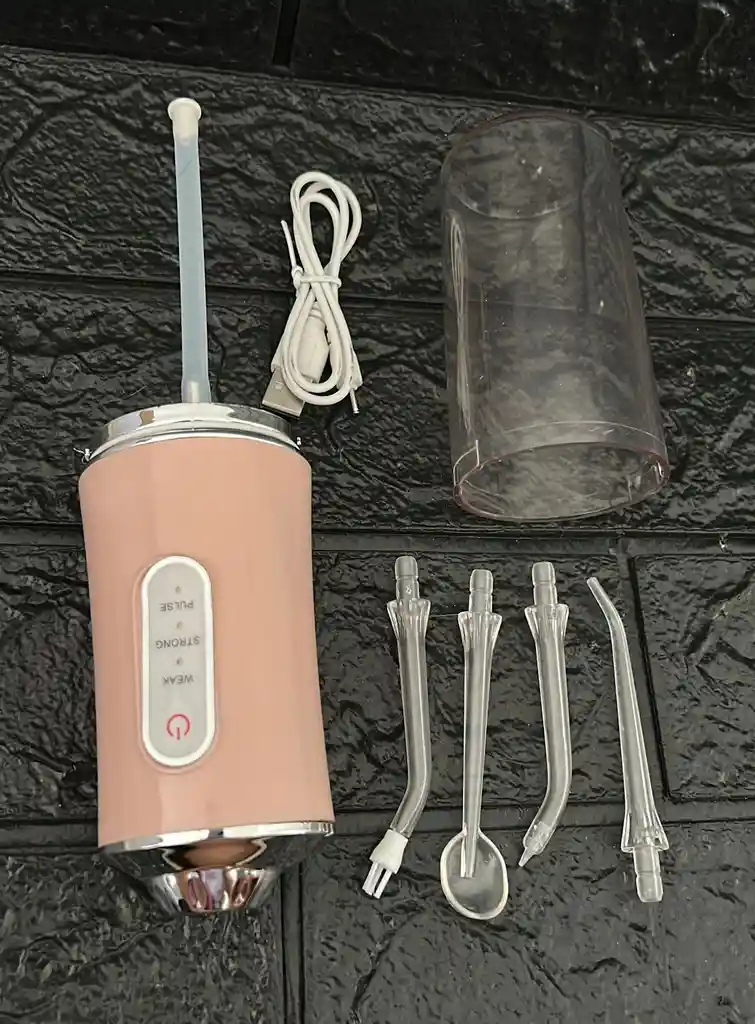 Irrigador Bucal Portatil Rosado