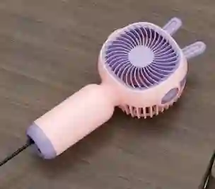 Ventilador Portatil De Mano Recargable Color Rosado Con Morado