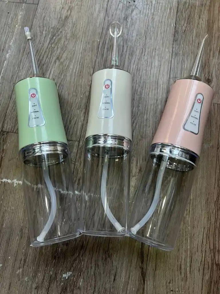 Irrigador Dental
