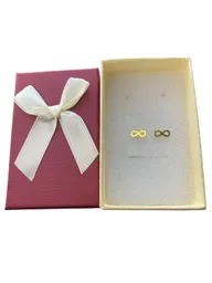 Aretes Tipo Topo Con Diseño De Infinito En Acero