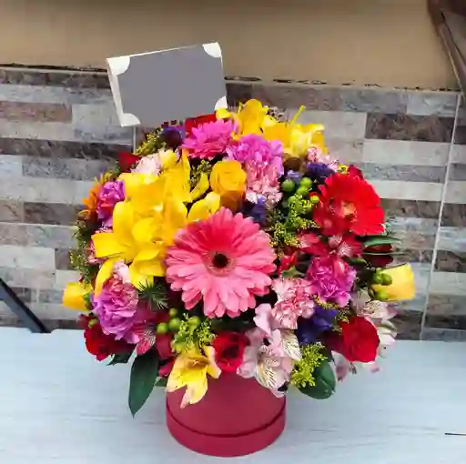 Flores De Colores En Base Cilindrica