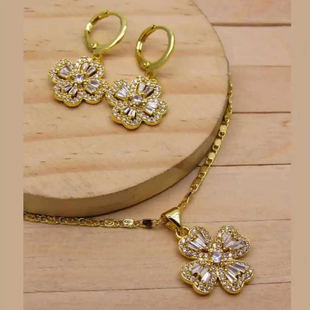 Juego De Collar Y Aretes De Seguridad En Rodio Dorado Flor