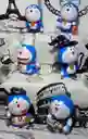 Set X 2 Figuras Pequeñas Doraemon El Gato Cósmico Pvc 8 Cms