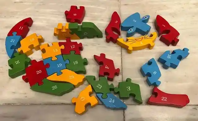 Rompecabezas De Madera En Forma De Dino