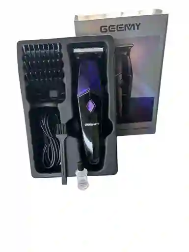 Maquina De Afeitar Y De Peluqueria Para Hombre Profesional Electrica Recargable Marca Geemy Incluye 4 Guias
