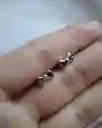 Aretes Plateados Con Diseño De Moño Pequeños