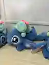 Stitch Con Peluche Scrump Acostado 30cm